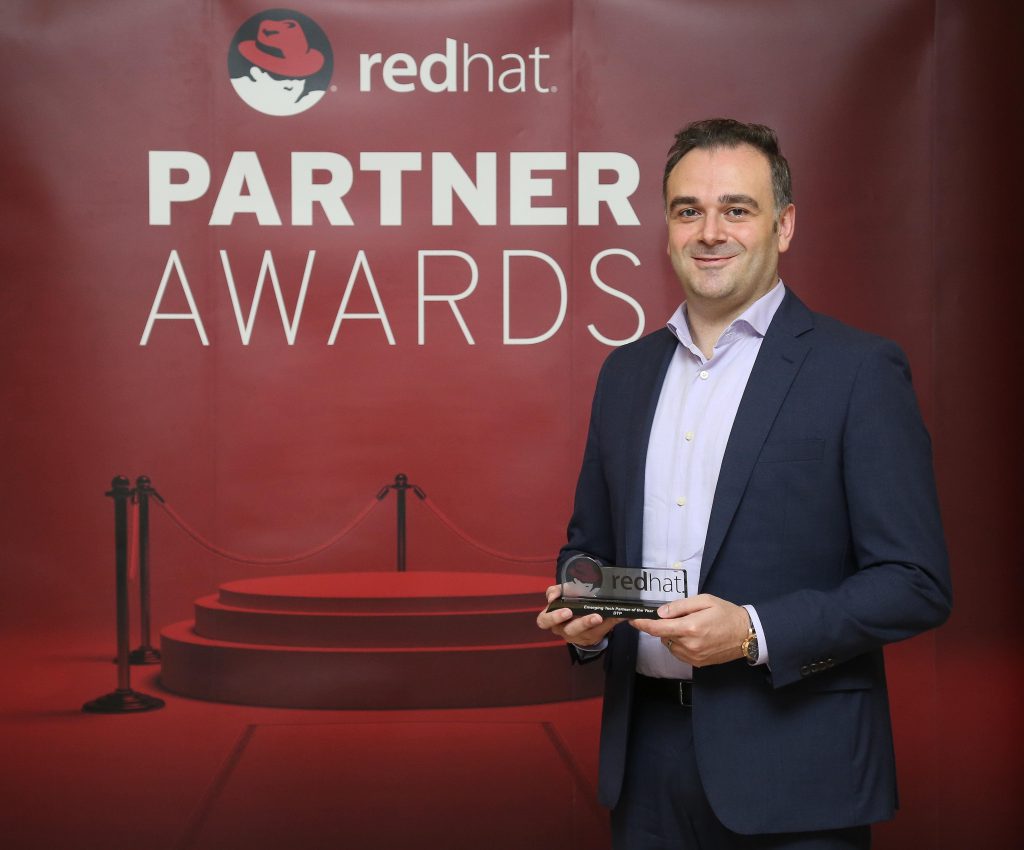 Fawaz Baroud, Account and PMO Director at DTP, accepts 'Emerging Tech Partner of the Year' award by our partner Red Hat.